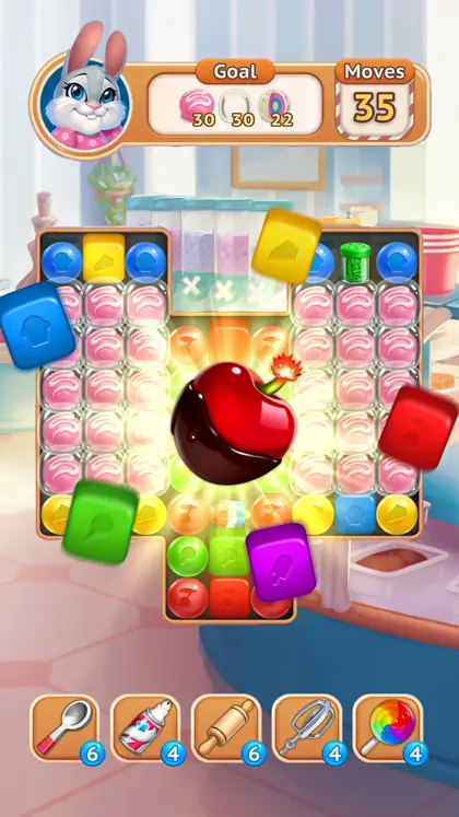 Tile-matching board with a cherry piece in Sweet Escapes: Build A Bakery